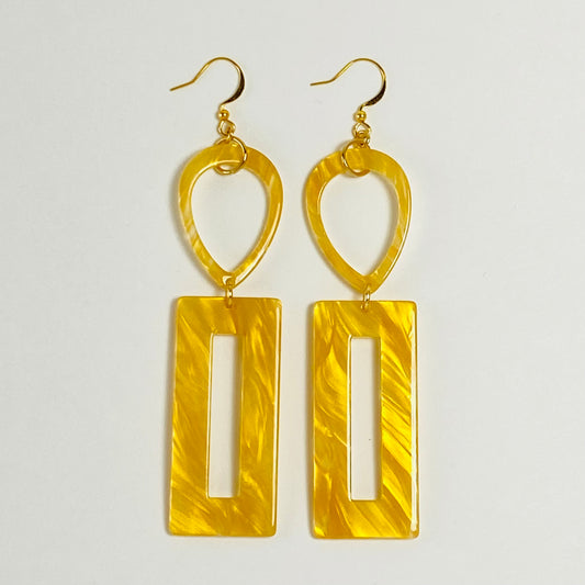 Dangling earrings with inverted teardrops and recatngle shaped  donuts beads.